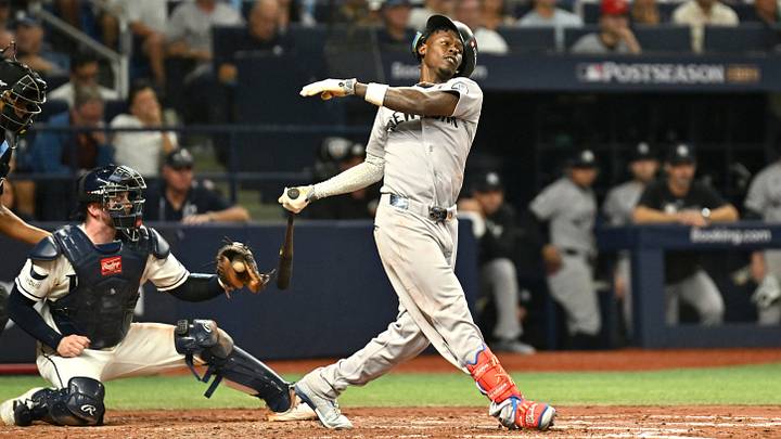 Oct 5, 2026; St. Petersburg, Florida, USA;  New York Yankees second baseman Jazz Chisholm Jr. (13) is out on a batted ball during the fifth inning against the Tampa Bay Rays in game two of the ALDS for the 2026 MLB Playoffs at Tropicana Field.  Mandatory Credit: Jonathan Dyer-Imagn Images