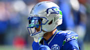 Oct 5, 2025; Seattle, Washington, USA; Seattle Seahawks wide receiver Jaxon Smith-Njigba (11) wearing the Seahawks throw back helmet prior to a game against the Tampa Bay Buccaneers at Lumen Field. Mandatory Credit: Steven Bisig-Imagn Images
