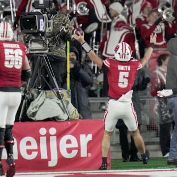 Wisconsin quarterback Carter Smith (5) celebrates his touchdown run during the third quarter of their game Saturday, November 8, 2025 at Camp Randall Stadium in Madison, Wisconsin. Wisconsin beat Washington 13-10.