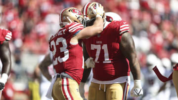 Christian McCaffrey, Trent Williams, San Francisco 49ers