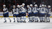 Feb 1, 2025; Washington, District of Columbia, USA; Winnipeg Jets players celebrate after their overtime game against the Washington Capitals at Capital One Arena. Mandatory Credit: Geoff Burke-Imagn Images