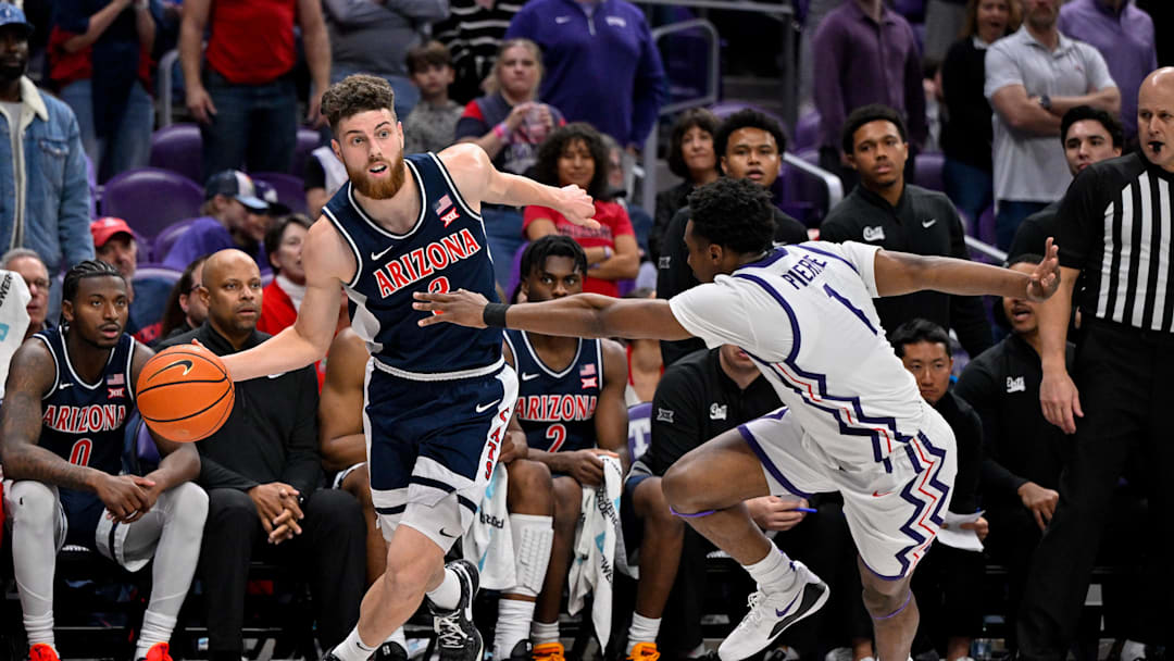 Jan 10, 2026; Fort Worth, Texas, USA; Arizona Wildcats guard Anthony Dell'orso (3) brings the ball up court past TCU Horned Frogs guard Jayden Pierre (1) during the game between the Horned Frogs and the Wildcats at Ed and Rae Schollmaier Arena. Mandatory Credit: Jerome Miron-Imagn Images