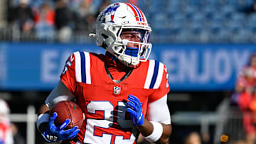 Dec 1, 2024; Foxborough, Massachusetts, USA; New England Patriots cornerback Marcus Jones (25) warms up before a game against the Indianapolis Colts at Gillette Stadium. Mandatory Credit: Eric Canha-Imagn Images