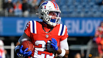 Dec 1, 2024; Foxborough, Massachusetts, USA; New England Patriots cornerback Marcus Jones (25) warms up before a game against the Indianapolis Colts at Gillette Stadium. Mandatory Credit: Eric Canha-Imagn Images
