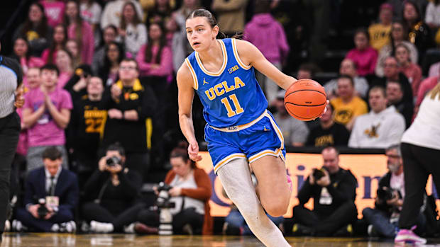 UCLA Bruins guard Gabriela Jaquez (11) dribbles against the Iowa Hawkeyes during the first quarter at Carver-Hawkeye Arena. 