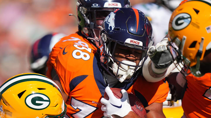 Oct 22, 2023; Denver, Colorado, USA; Denver Broncos running back Jaleel McLaughlin (38) during the first quarter against the Green Bay Packers at Empower Field at Mile High. Mandatory Credit: Ron Chenoy-Imagn Images