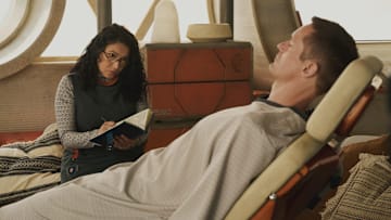 Tamara Podemski and Alexander Skarsgård in "Murderbot," now streaming on Apple TV+.