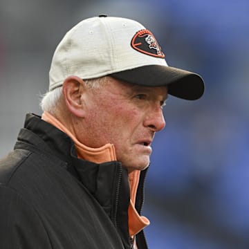 Browns owner Jimmy Haslam walks on the field before a game against the Ravens.
