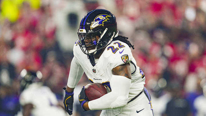 Sep 5, 2024; Kansas City, Missouri, USA; Baltimore Ravens running back Derrick Henry (22) runs the ball during the first half against the Kansas City Chiefs at GEHA Field at Arrowhead Stadium. Mandatory Credit: Jay Biggerstaff-Imagn Images