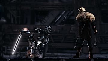 (L-R): The Mandalorian (Pedro Pascal) and the Armorer (Emily Swallow) in Lucasfilm's THE BOOK OF BOBA FETT, exclusively on Disney+. © 2022 Lucasfilm Ltd. & ™. All Rights Reserved.