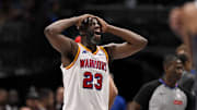 Feb 12, 2025; Dallas, Texas, USA; Golden State Warriors forward Draymond Green (23) reacts to a foul call on three point attempt by Dallas Mavericks guard Kyrie Irving (not pictured) during the fourth quarter at the American Airlines Center. Mandatory Credit: Jerome Miron-Imagn Images
