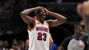 Feb 12, 2025; Dallas, Texas, USA; Golden State Warriors forward Draymond Green (23) reacts to a foul call on three point attempt by Dallas Mavericks guard Kyrie Irving (not pictured) during the fourth quarter at the American Airlines Center. Mandatory Credit: Jerome Miron-Imagn Images