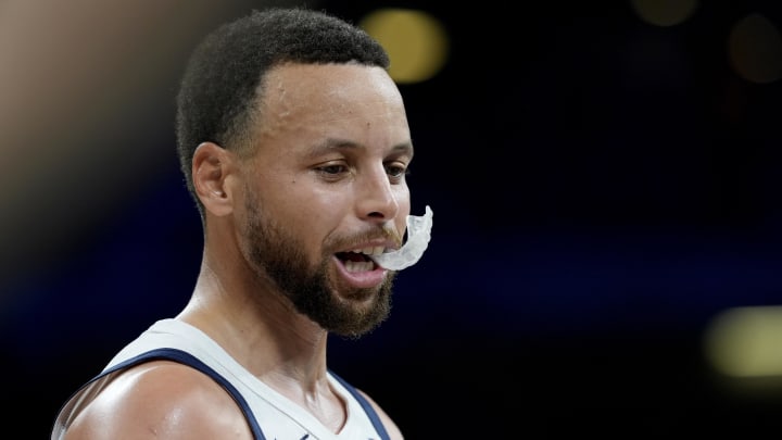 Jul 31, 2024; Villeneuve-d'Ascq, France; United States guard Stephen Curry (4) in the second quarter against South Sudan during the Paris 2024 Olympic Summer Games at Stade Pierre-Mauroy. 