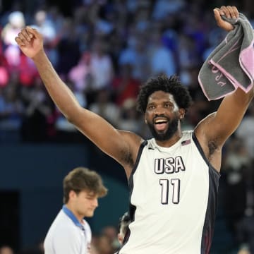 Aug 8, 2024; Paris, France; United States centre Joel Embiid (11) celebrates after the game against Serbia in a men's basketball semifinal game during the Paris 2024 Olympic Summer Games at Accor Arena. Mandatory Credit: Kyle Terada-USA TODAY Sports