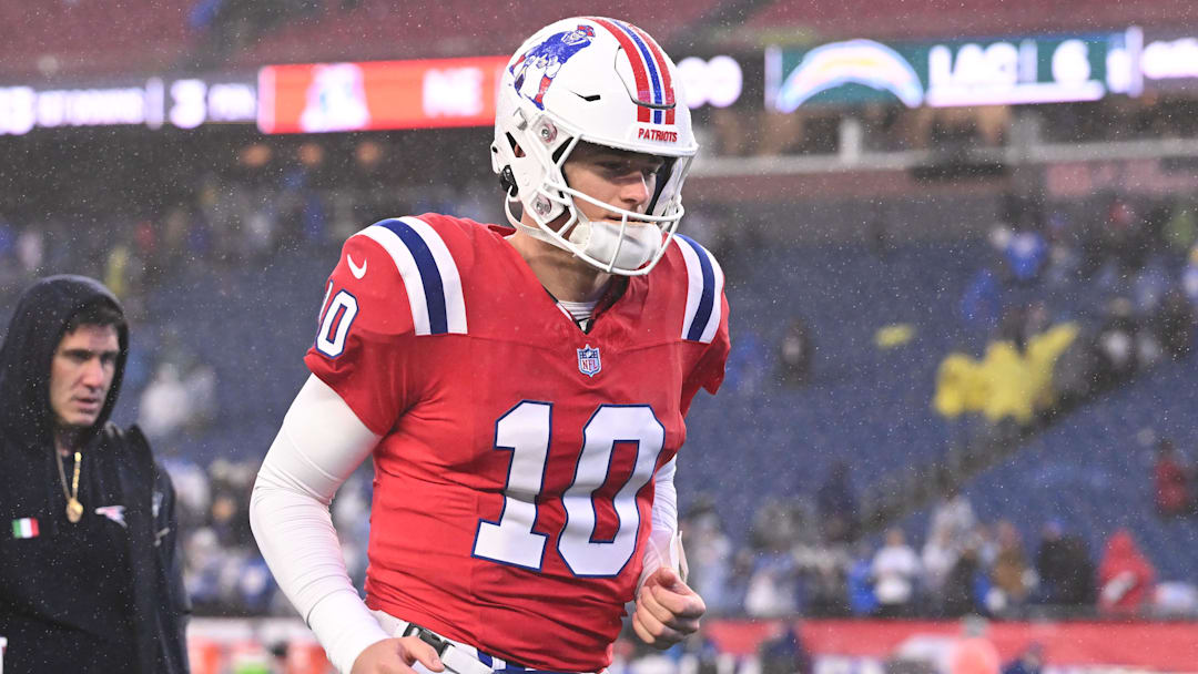 Dec 3, 2023; Foxborough, Massachusetts, USA; New England Patriots quarterback Mac Jones (10) walks off of the field after a game against the Los Angeles Chargers during the second half at Gillette Stadium. Mandatory Credit: Brian Fluharty-Imagn Images