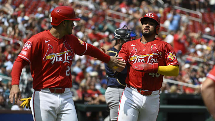 Sep 8, 2024; St. Louis, Missouri, USA; St. Louis Cardinals third baseman Nolan Arenado (28) celebrates with catcher Ivan Herrera (48) after scoring on a single from second baseman Jose Fermin (not pictured) during the second inning of a baseball game against the Seattle Mariners at Busch Stadium. Mandatory Credit: Jeff Le-Imagn Images