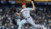 Aug 26, 2025; Los Angeles, California, USA; Cincinnati Reds relief pitcher Brent Suter (31) pitches during the sixth inning against the Los Angeles Dodgers at Dodger Stadium. Mandatory Credit: Kiyoshi Mio-Imagn Images