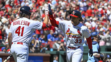 Apr 2, 2023; St. Louis, Missouri, USA;  St. Louis Cardinals second baseman Brendan Donovan (33) celebrates with left fielder Alec Burleson (41) after hitting a solo home run against the Toronto Blue Jays during the first inning at Busch Stadium. Mandatory Credit: Jeff Curry-Imagn Images