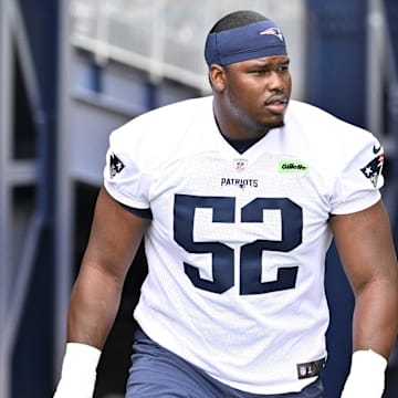 Jun 9, 2025; Foxborough, MA, USA; New England Patriots offensive tackle Marcus Bryant (52) walks to the practice fields at Gillette Stadium. Mandatory Credit: Eric Canha-Imagn Images