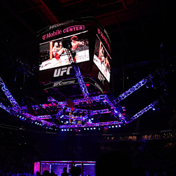 Apr 26, 2025; Kansas City, Missouri, UNITED STATES; A general view of the Octagon while Giga Chikadze (red gloves) fights David Onama (blue gloves) during UFC Fight Night at T-Mobile Center. Mandatory Credit: William Purnell-Imagn Images