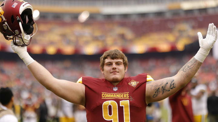 Oct 23, 2022; Landover, Maryland, USA; Washington Commanders defensive tackle John Ridgeway (91) celebrates while leaving the field after the Commanders' game against the Green Bay Packers at FedExField. Mandatory Credit: Geoff Burke-USA TODAY Sports