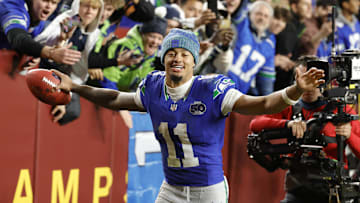 Nov 2, 2025; Landover, Maryland, USA;  Seattle Seahawks wide receiver Jaxon Smith-Njigba (11) reacts to the win against the Washington Commanders at Northwest Stadium. Mandatory Credit: Geoff Burke-Imagn Images