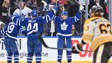 Dec 2, 2023; Toronto, Ontario, CAN; Toronto Maple Leafs forward Auston Matthews (34) celebrates with teammates Morgan Rielly (44) and Calle Jarnkrok (19) after a Leafs goal.