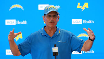 Jul 24, 2024; El Segundo, CA, USA;  Los Angeles Chargers head coach Jim Harbaugh speaks to the media after the first day of training camp at The Bolt. Mandatory Credit: Kiyoshi Mio-USA TODAY Sports