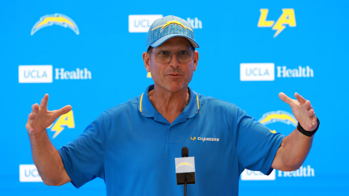 Jul 24, 2024; El Segundo, CA, USA;  Los Angeles Chargers head coach Jim Harbaugh speaks to the media after the first day of training camp at The Bolt. Mandatory Credit: Kiyoshi Mio-USA TODAY Sports