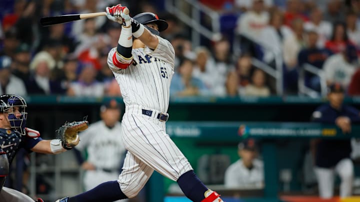 Mar 21, 2023; Miami, Florida, USA; Japan third baseman Munetaka Murakami (55) hits a home run during the second inning against USA at LoanDepot Park. Mar 21, 2023; Miami, Florida, USA; Japan third baseman Munetaka Murakami (55) hits a home run during the second inning against USA at LoanDepot Park.