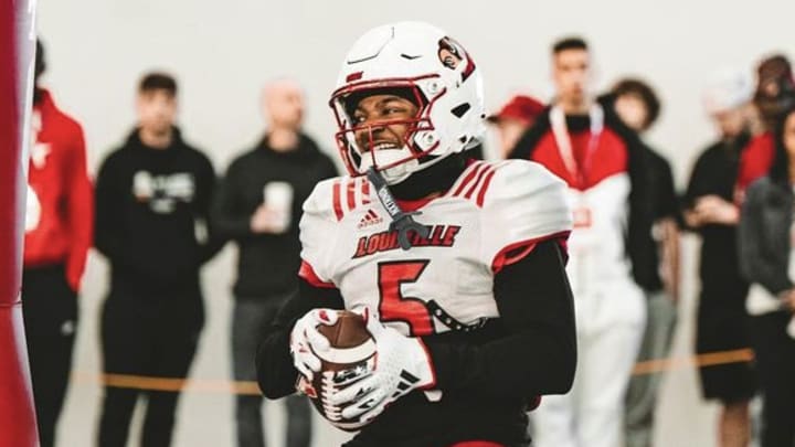 Louisville wide receiver Caullin Lacy runs drills during spring practice.