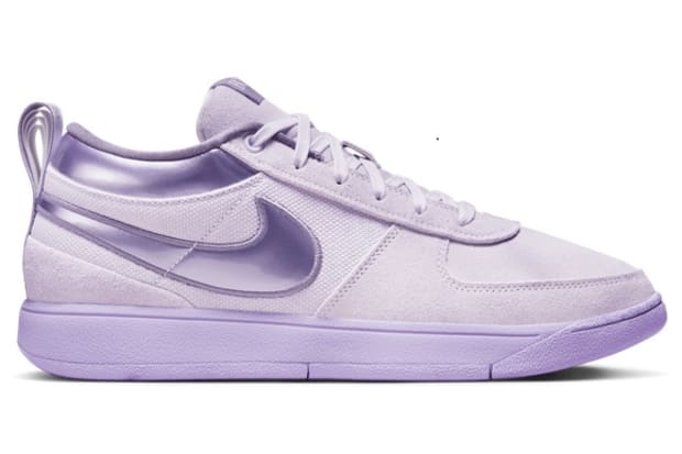 Purple Nike sneakers.