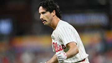Sep 24, 2024; Philadelphia, Pennsylvania, USA; Philadelphia Phillies catcher Garrett Stubbs (21) reacts after reaching first base safely on an RBI bunt against the Chicago Cubs in the second inning at Citizens Bank Park. Mandatory Credit: Kyle Ross-Imagn Images