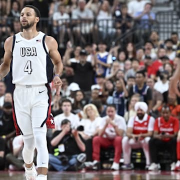 Jul 10, 2024; Las Vegas, Nevada, USA; USA guard Steph Curry (4) celebrates scoring on Canada during the first quarter of the USA Basketball Showcase at T-Mobile Arena. Mandatory Credit: Candice Ward-Imagn Images