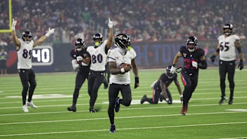 Dec 25, 2024; Houston, Texas, USA; Baltimore Ravens quarterback Lamar Jackson (8) rushes for a 48 yard touchdown against the Houston Texans in the third quarter at NRG Stadium. Mandatory Credit: Thomas Shea-Imagn Images