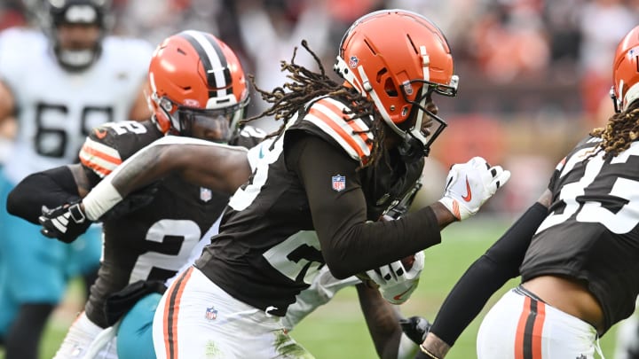 Dec 10, 2023; Cleveland, Ohio, USA; Cleveland Browns cornerback Martin Emerson Jr. (23) returns an interception during the first half against the Jacksonville Jaguars at Cleveland Browns Stadium. Mandatory Credit: Ken Blaze-USA TODAY Sports