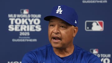 Mar 15, 2025; Bunkyo, Tokyo, Japan; Los Angeles Dodgers manager Dave Roberts (30) talks to media members before the game against the Yomiuri Giants at Tokyo Dome. Mandatory Credit: Darren Yamashita-Imagn Images