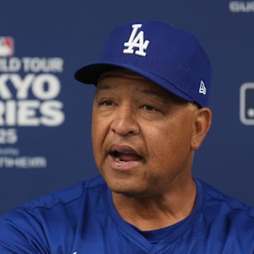 Mar 15, 2025; Bunkyo, Tokyo, Japan; Los Angeles Dodgers manager Dave Roberts (30) talks to media members before the game against the Yomiuri Giants at Tokyo Dome. Mandatory Credit: Darren Yamashita-Imagn Images