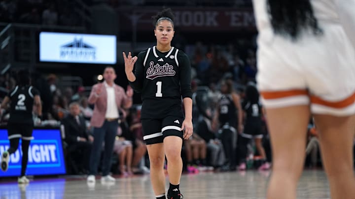 Feb 22, 2026; Austin, Texas, USA; Mississippi Rebels guard Saniyah King (1) celebrates a three point basket during the second half against the Texas Longhorns at Moody Center. Mandatory Credit: Dustin Safranek-Imagn Images