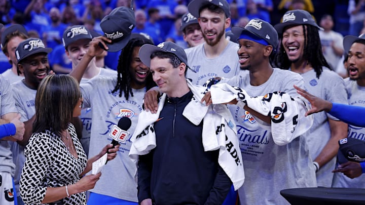 May 28, 2025; Oklahoma City, Oklahoma, USA; Oklahoma City Thunder head coach Mark Daigneault celebrates with his team after defeating the Minnesota Timberwolves in game five to win the western conference finals for the 2025 NBA Playoffs at Paycom Center. Mandatory Credit: Alonzo Adams-Imagn Images