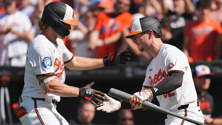 Sep 2, 2024; Baltimore, Maryland, USA; Baltimore Orioles shortstop Gunnar Henderson (left) celebrates his first inning solo home run with first baseman Ryan OíHearn (right) against the Chicago White Sox at Oriole Park at Camden Yards.