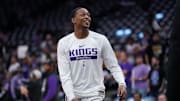 Apr 26, 2023; Sacramento, California, USA; Sacramento Kings guard De'Aaron Fox (5) smiles during warmups against the Golden State Warriors during game five of the 2023 NBA playoffs at the Golden 1 Center. Mandatory Credit: Cary Edmondson-Imagn Images