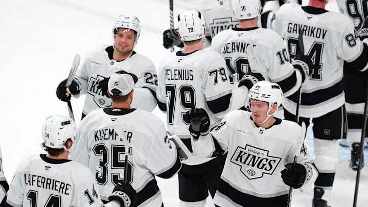 Mar 9, 2025; Las Vegas, Nevada, USA; Los Angeles Kings players celebrate after defeating the Vegas Golden Knights 6-5 at T-Mobile Arena. Mandatory Credit: Stephen R. Sylvanie-Imagn Images