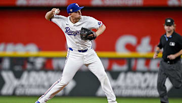 Jul 6, 2024; Arlington, Texas, USA; Texas Rangers shortstop Corey Seager (5) in action during the game between the Texas Rangers and the Tampa Bay Rays at Globe Life Field. Mandatory Credit: Jerome Miron-USA TODAY Sports