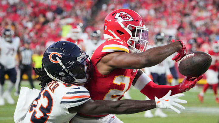 Aug 22, 2024; Kansas City, Missouri, USA; Kansas City Chiefs cornerback Kelvin Joseph (24) breaks up a pass intended for Chicago Bears wide receiver Nsimba Webster (83) during the game at GEHA Field at Arrowhead Stadium.