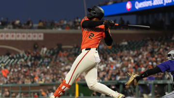 Jul 26, 2024; San Francisco, California, USA;  San Francisco Giants designated hitter Jorge Soler (2) hits a RBI single during the fourth inning against the Colorado Rockies at Oracle Park.