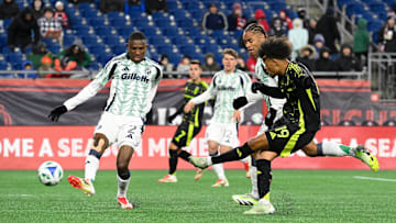 Mar 1, 2025; Foxborough, Massachusetts, USA; Columbus Crew forward Jacen Russell-Rowe (19) scores a goal against the New England Revolution during the second half at Gillette Stadium. Mandatory Credit: Eric Canha-Imagn Images