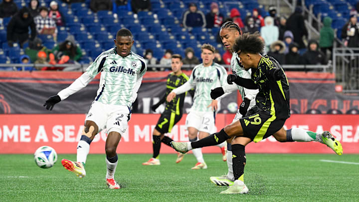 Mar 1, 2025; Foxborough, Massachusetts, USA; Columbus Crew forward Jacen Russell-Rowe (19) scores a goal against the New England Revolution during the second half at Gillette Stadium. Mandatory Credit: Eric Canha-Imagn Images