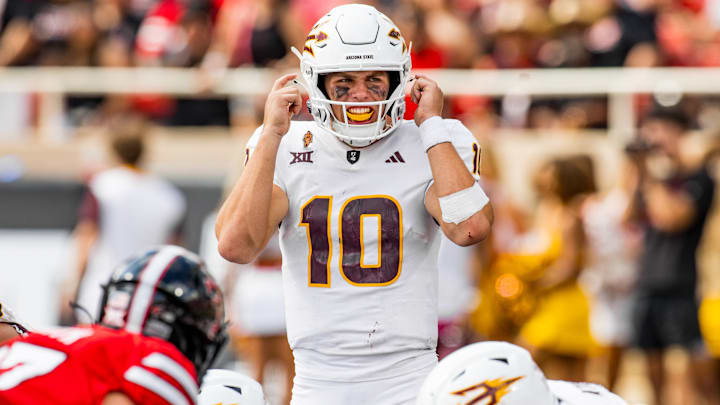 Quarterback am Leavitt audibles a play during their loss against Texas Tech 