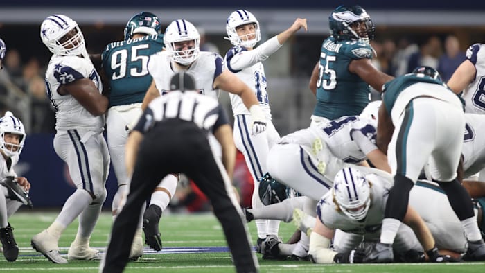 Dec 10, 2023; Arlington, Texas, USA; Dallas Cowboys place kicker Brandon Aubrey (17) watches a made